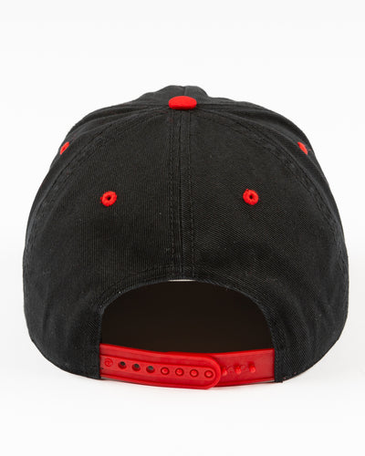 black and red '47 brand snapback hat with Chicago Blackhawks wordmark and primary logo embroidered on the front - back lay flat