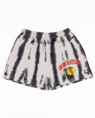 youth girl shorts with all over distressed print and Chicago Blackhawks wordmark and primary logo printed on left leg - front lay flat