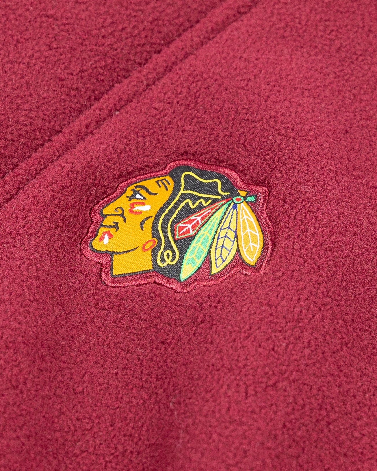 red Mitchell & Ness cropped funnel neck quarter zip with Chicago Blackhawks primary logo on left chest and wordmark on back - detail front lay flat