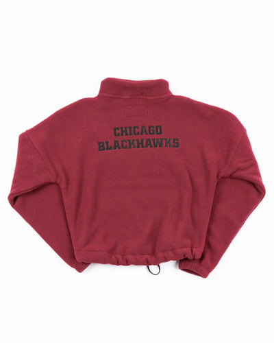 red Mitchell & Ness cropped funnel neck quarter zip with Chicago Blackhawks primary logo on left chest and wordmark on back - back lay flat