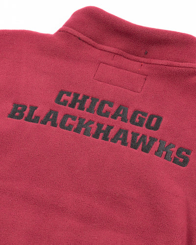 red Mitchell & Ness cropped funnel neck quarter zip with Chicago Blackhawks primary logo on left chest and wordmark on back - bac detail lay flat