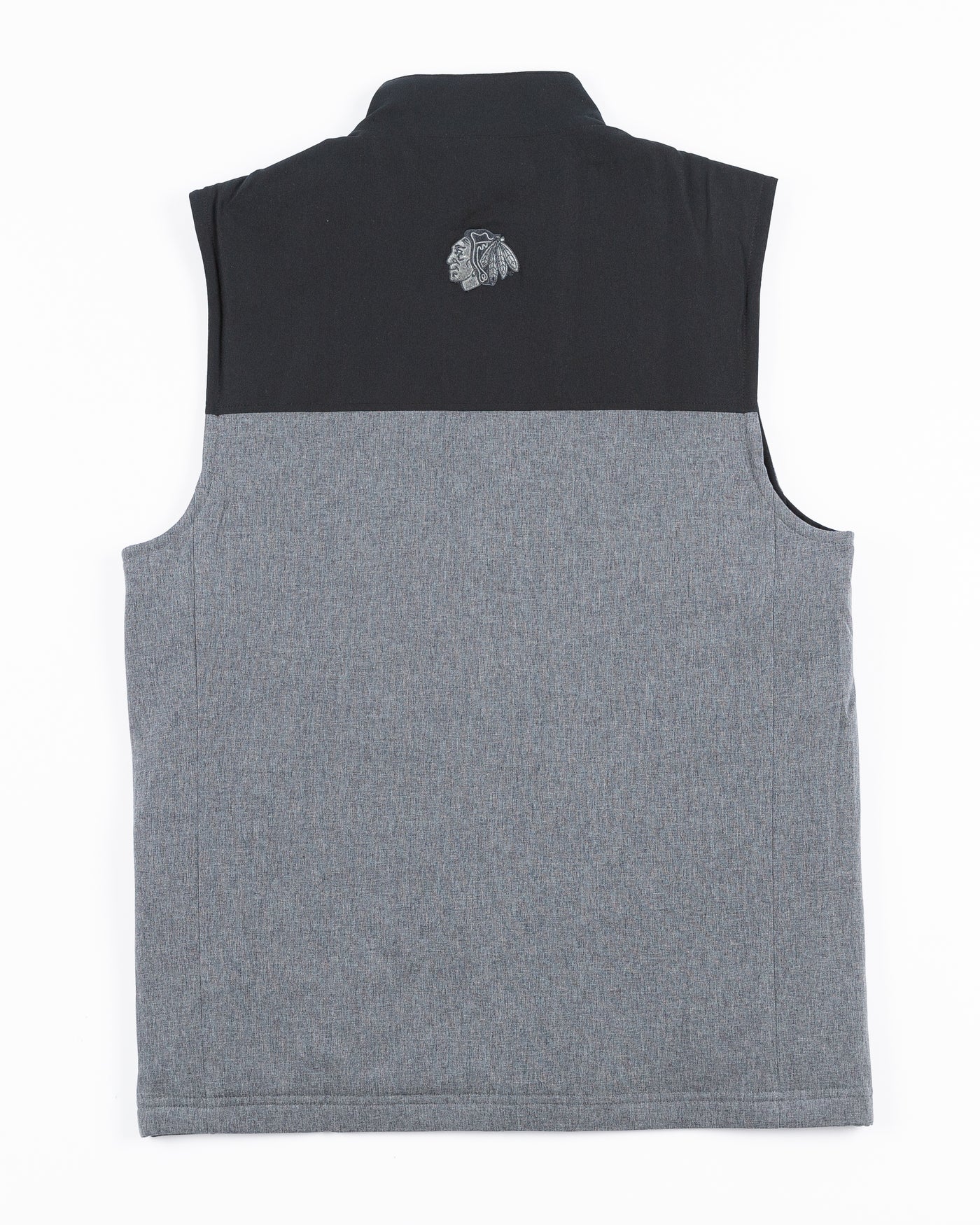 two tone black and grey TravisMathew vest with Chicago Blackhawks primary logo embroidered on back yoke - back lay flat