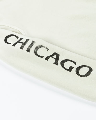 off white Sportiqe hoodie with Chicago Blackhawks primary logo on left chest and Chicago wordmark on right arm - detail wordmark lay flat