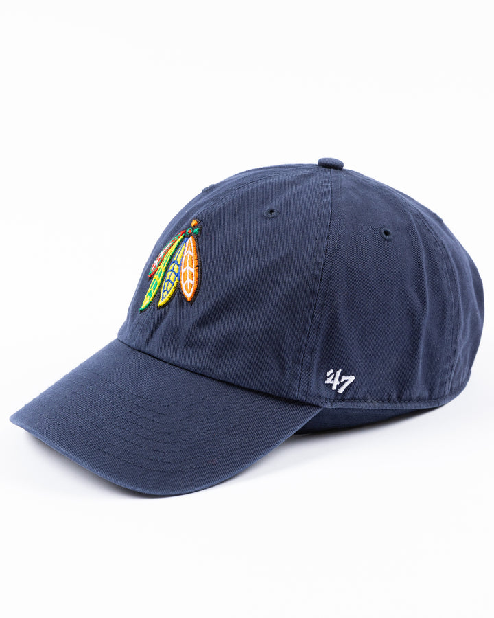 navy '47 brand adjustable cap with Chicago Blackhawks four feathers logo embroidered on front and UIC logo on right side - left angle lay flat