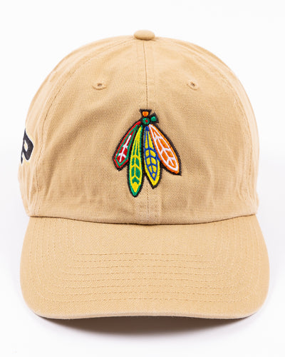 khaki '47 brand adjustable cap with Chicago Blackhawks four feathers logo embroidered on front and Purdue University logo embroidered on right side - front lay flat