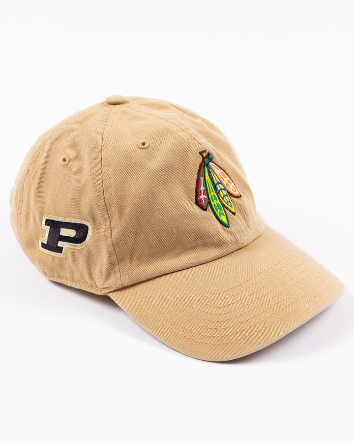 khaki '47 brand adjustable cap with Chicago Blackhawks four feathers logo embroidered on front and Purdue University logo embroidered on right side - right angle lay flat