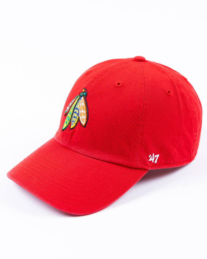 red '47 brand adjustable cap with Chicago Blackhawks four feathers logo on front and University of Wisconsin Madison logo on right side - left angle lay flat