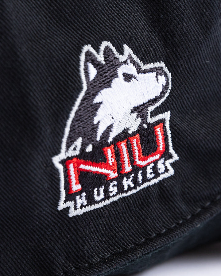 black '47 brand adjustable cap with Chicago Blackhawks four feathers embroidered on front and NIU logo embroidered on right side - university logo detail lay flat