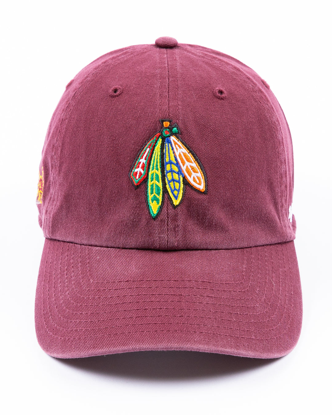 maroon '47 brand adjustable hat with Chicago Blackhawks four feathers logo embroidered on front and Loyola University Chicago logo embroidered on right side - front lay flat