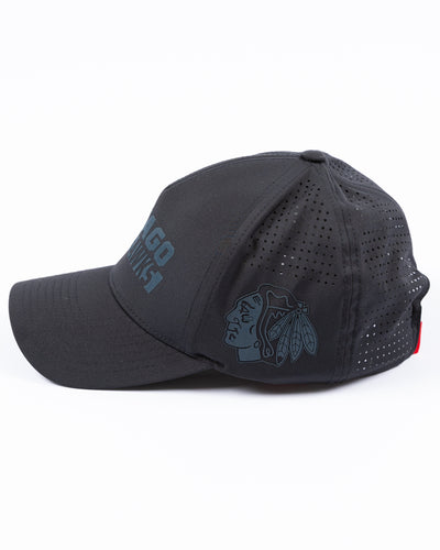 black CCM adjustable lightweight breathable cap with Chicago Blackhawks wordmark on front and tonal primary logo on left side - left side lay flat