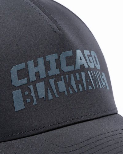 black CCM adjustable lightweight breathable cap with Chicago Blackhawks wordmark on front and tonal primary logo on left side - detail lay flat