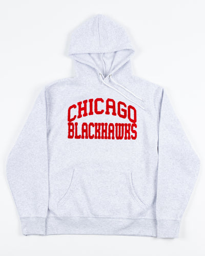 light grey zoozatz women's hoodie with red chenille Chicago Blackhawks wordmark across chest - front lay flat