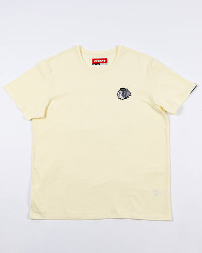 eggshell CCM short sleeve tee with Chicago Blackhawks tonal primary logo embroidered on left chest - front lay flat