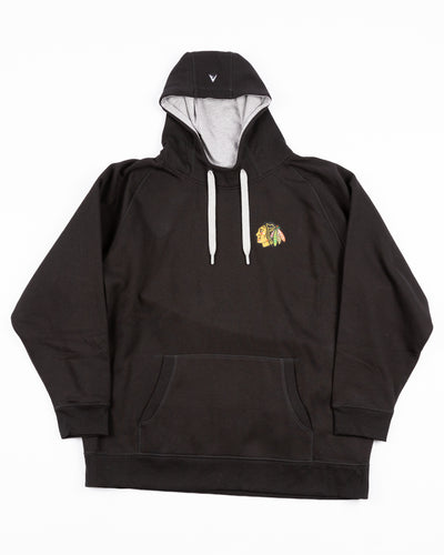 black big & tall Antigua hoodie with embroidered Chicago Blackhawks primary logo on left chest - front lay flat