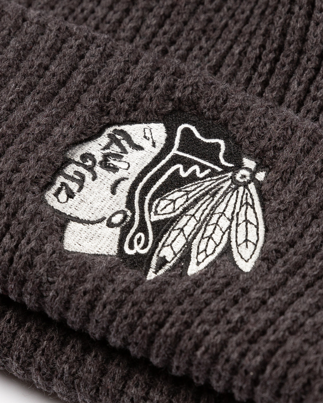 grey CCM watchman beanie with tonal Chicago Blackhawks primary logo on front cuff - front detail lay flat