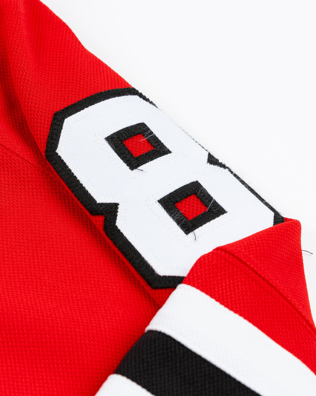 red adidas Chicago Blackhawks jersey of Marian Hossa - alt shoulder detail lay flat