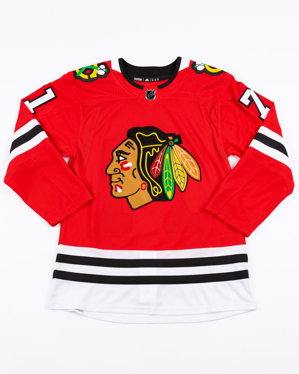 red adidas Chicago Blackhawks hockey jersey with Taylor Hall name and number - front lay flat