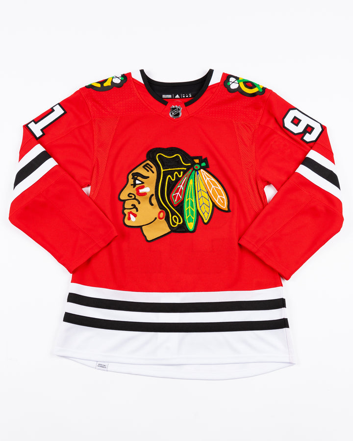 red adidas Chicago Blackhawks hockey jersey with stitched Frank Nazar name and number - front lay flat