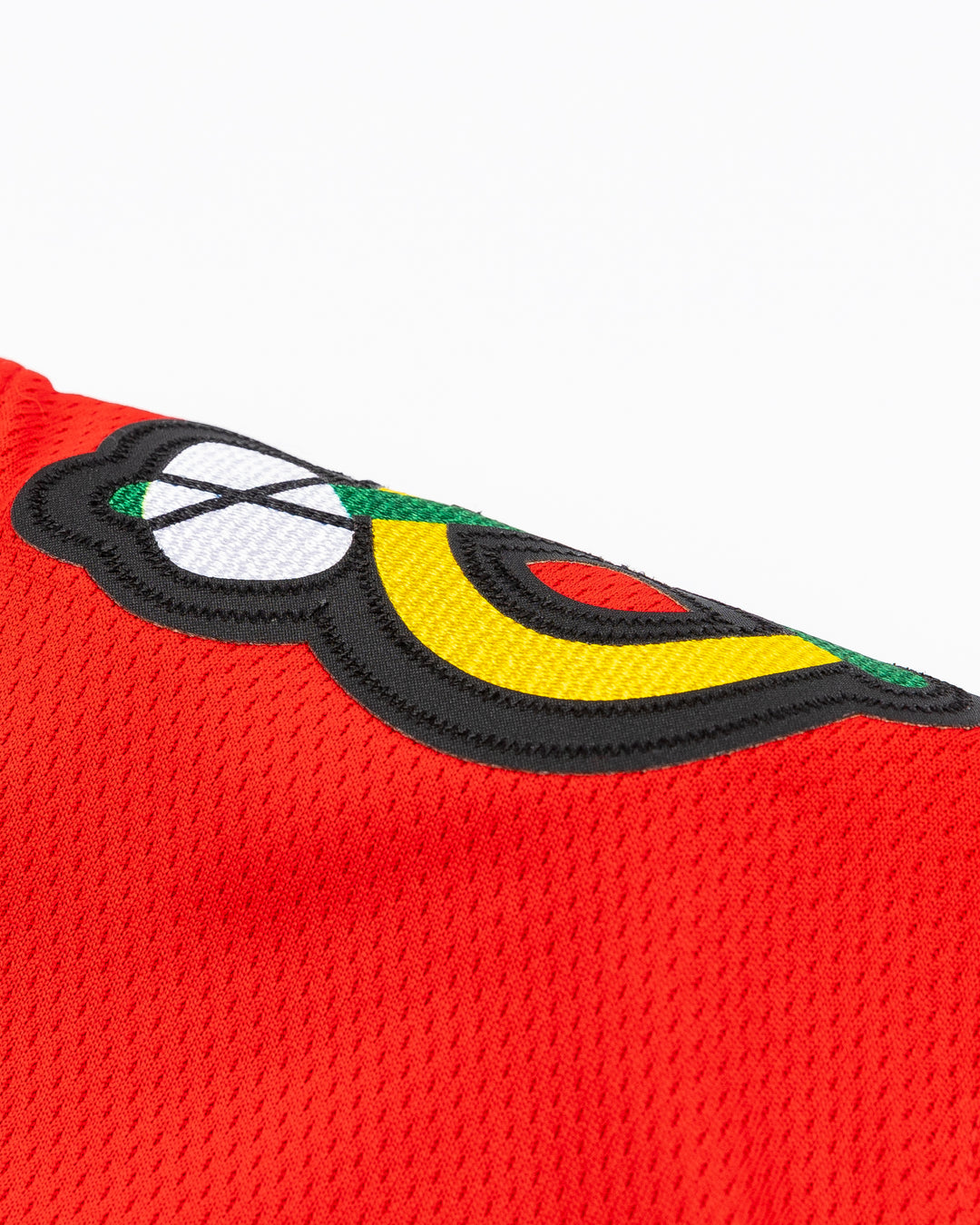 red Fanatics Chicago Blackhawks hockey jersey with stitched Nick Foligno name and number - alt shoulder detail  lay flat