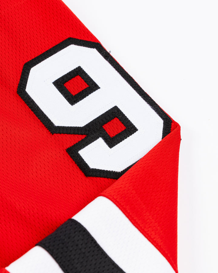 red Fanatics Chicago Blackhawks hockey jersey with stitched Frank Nazar name and number - shoulder detail lay flat