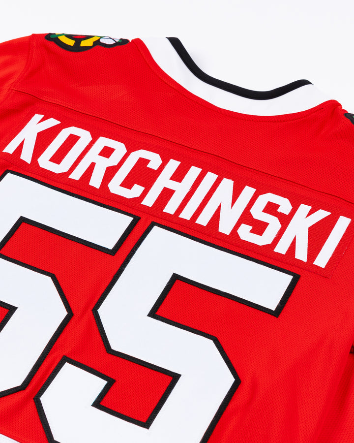 red Fanatics Chicago Blackhawks jersey with stitched Kevin Korchinski name and number - back detail  lay flat