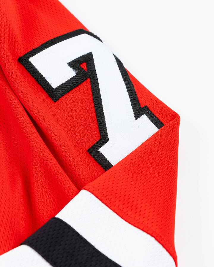 red Fanatics Chicago Blackhawks hockey jersey with stitched Chris Chelios name and number - shoulder detail lay flat