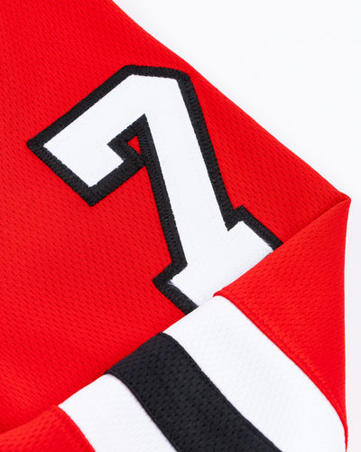 red Fanatics hockey jersey with stitched Alex Vlasic name and number - shoulder detail lay flat