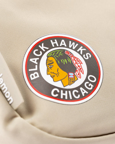 off white lululemon belt bag with vintage Chicago Blackhawks logo printed on front - detail lay flat