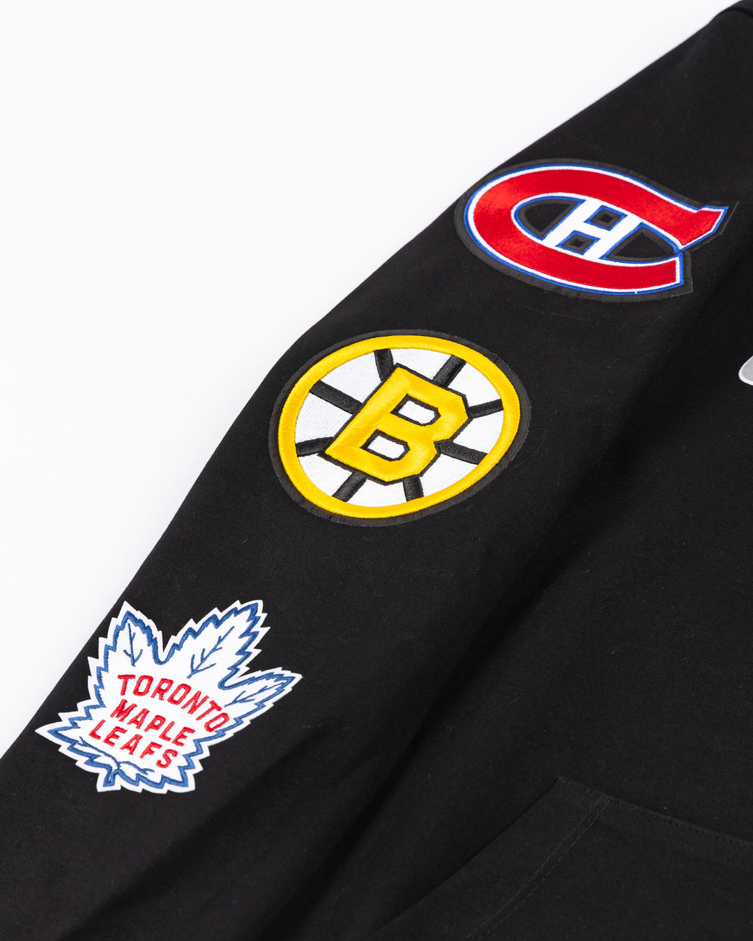 black Pro Standard Chicago Blackhawks hoodie with Original Six NHL team patches embroidered on arms - right arm detail lay flat