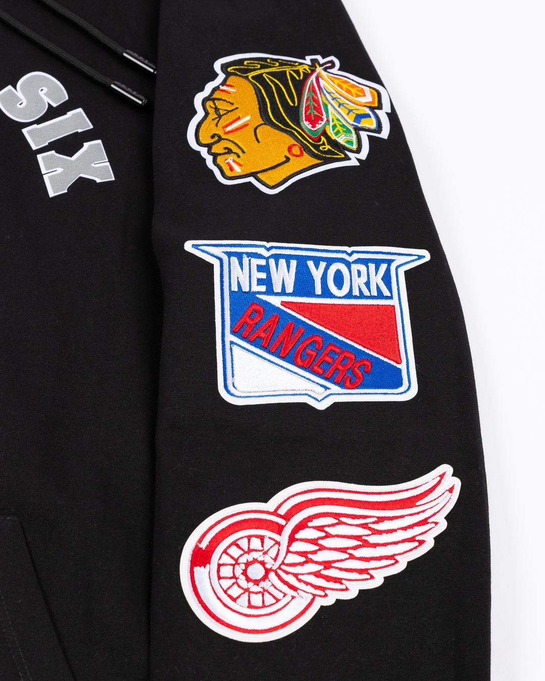 black Pro Standard Chicago Blackhawks hoodie with Original Six NHL team patches embroidered on arms - left arm detail lay flat