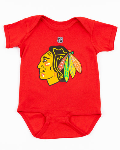 red Chicago Blackhawks newborn onesie with primary logo across front - front lay flat