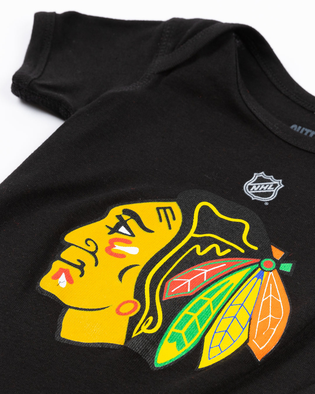 black Outerstuff Chicago Blackhawks newborn onesie with primary logo across front - detail lay flat