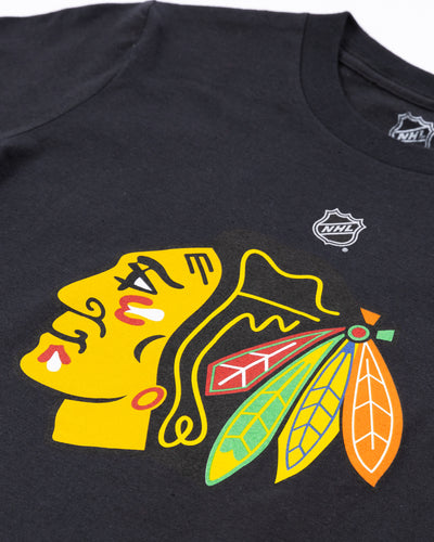 black Chicago Blackhawks youth short sleeve tee with primary logo across front - detail lay flat