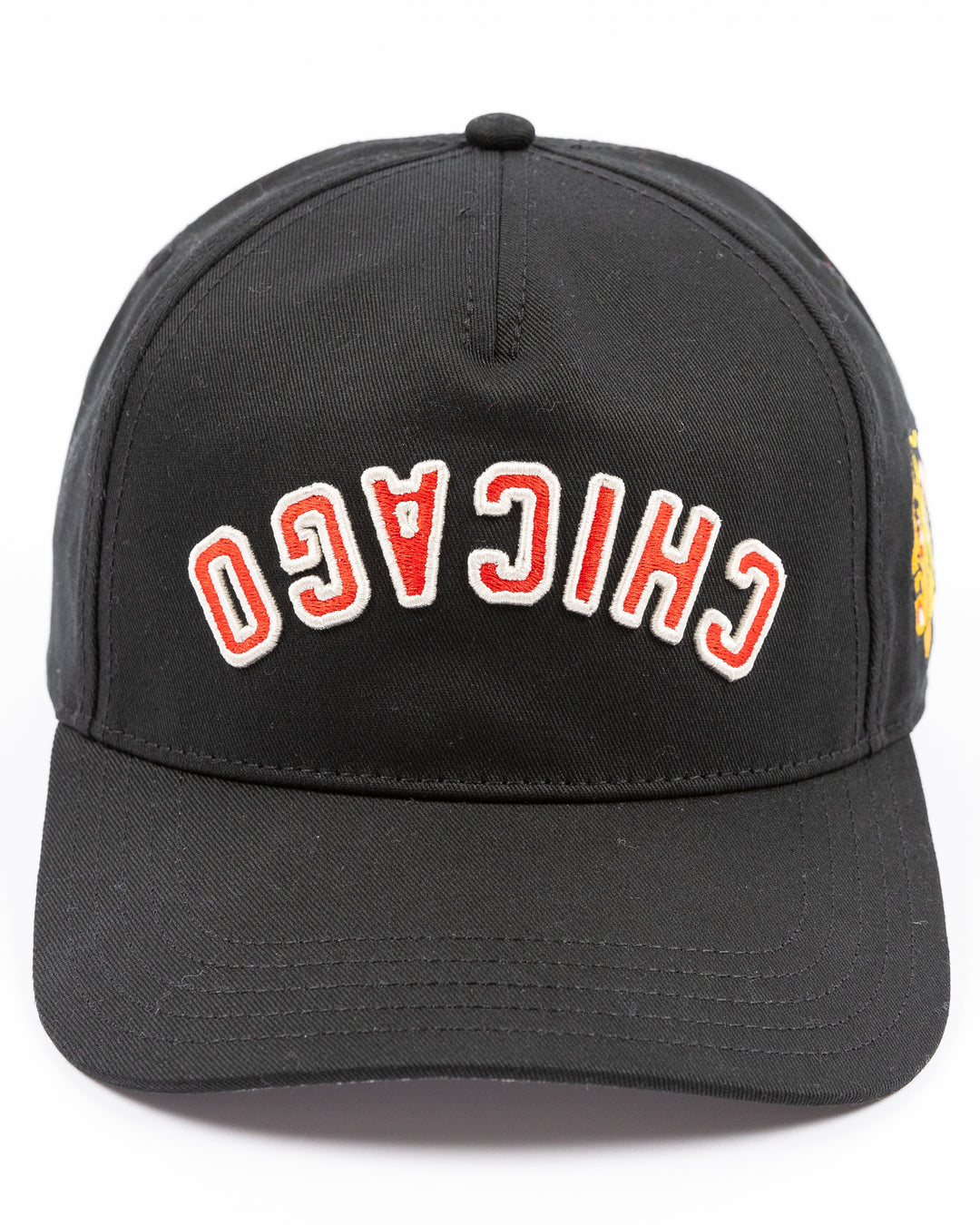 black American Needle adjustable Roscoe hat with upside down Chicago wordmark embroidered on front and Chicago Blackhawks primary logo embroidered on left side - front lay flat