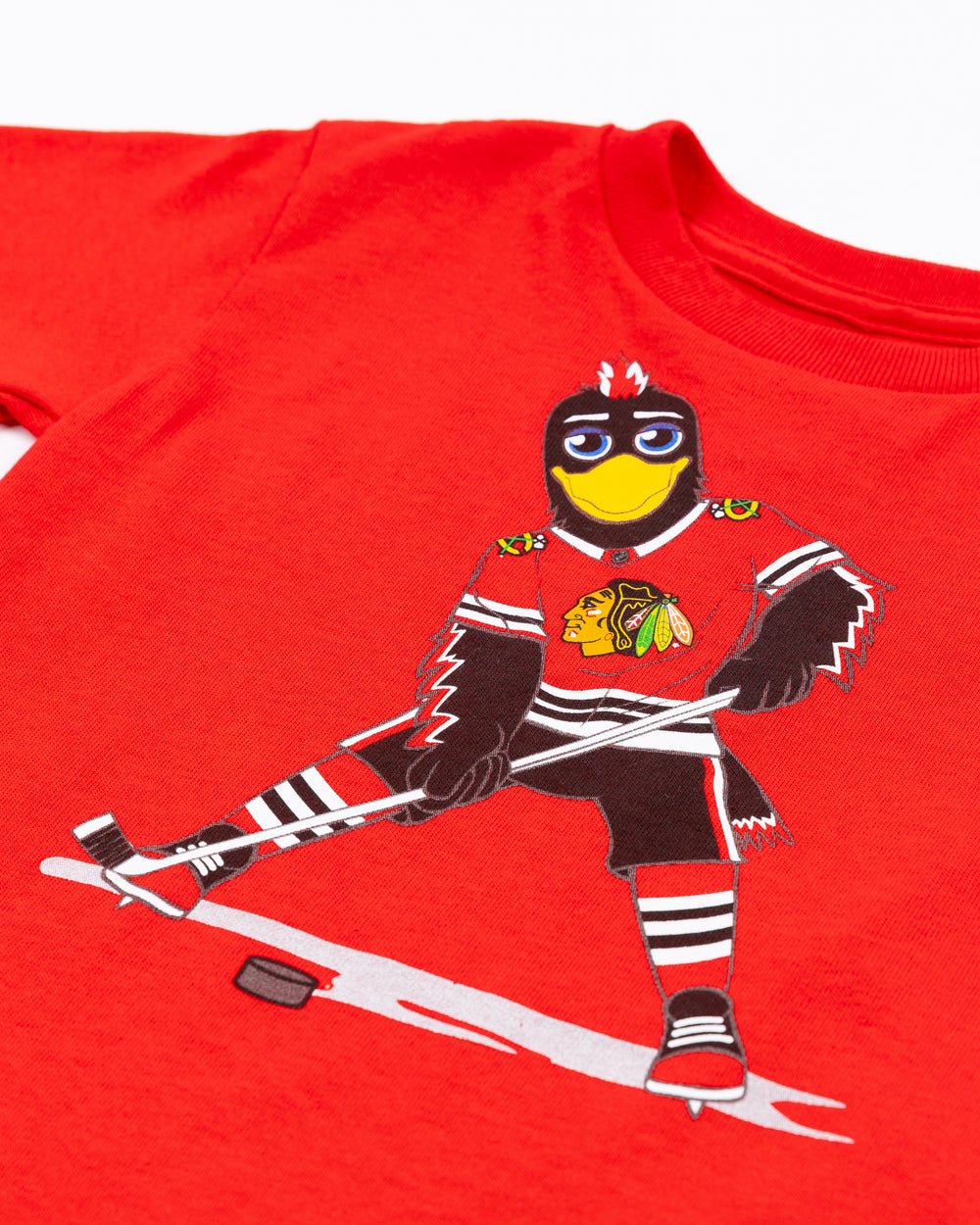 red Mitchell & Ness toddler short sleeve tee with Chicago Blackhawks mascot Tommy Hawk on front - front detail lay flat