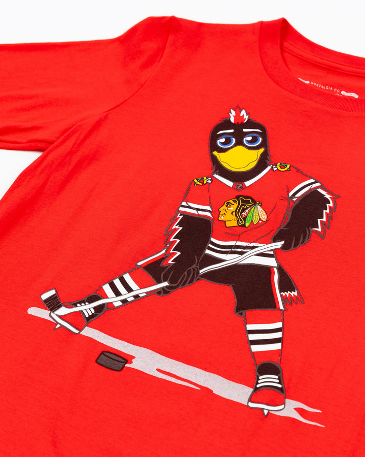 red Mitchell & Ness youth short sleeve tee with Chicago Blackhawks mascot Tommy Hawk on front - detail lay flat