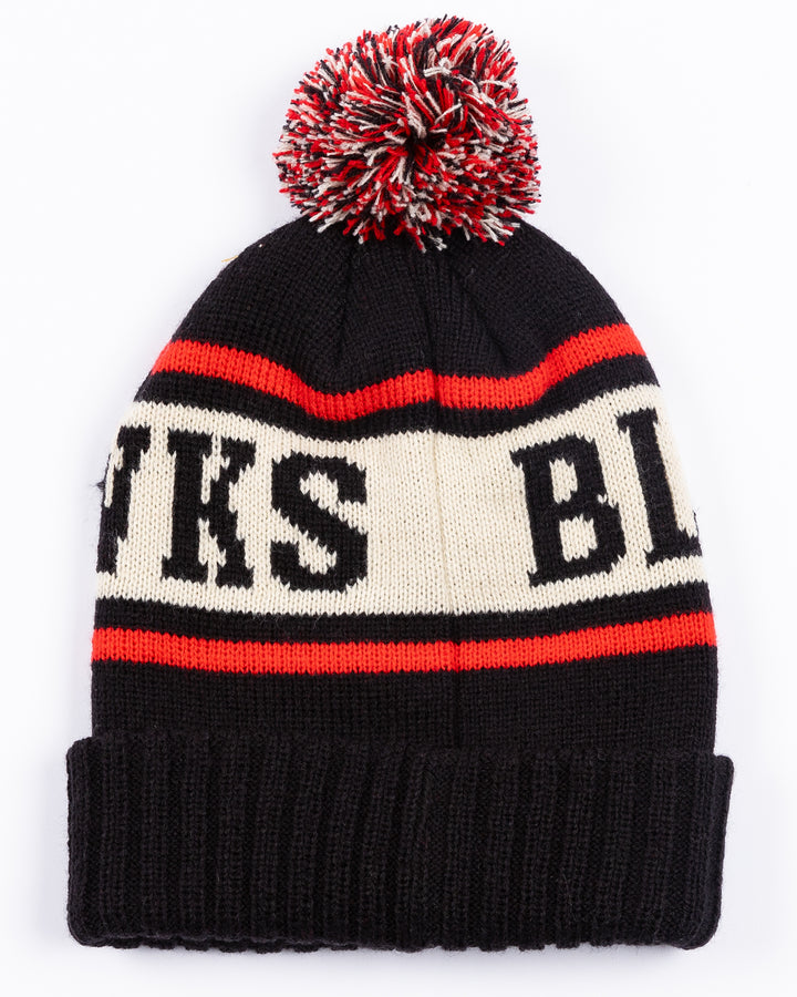 American Needle black knit pom hat with Chicago Blackhawks wordmark on front and embroidered primary logo on front cuff - back lay flat