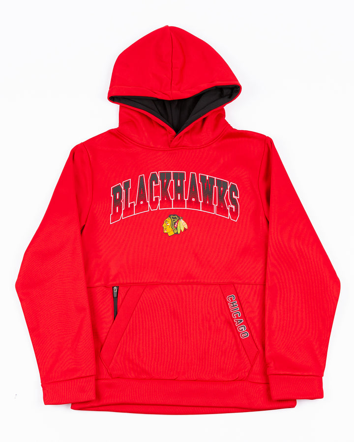 red Colosseum youth hoodie with Chicago Blackhawks wordmark and primary logo across front and Chicago wordmark on kangaroo pocket seam - front lay flat