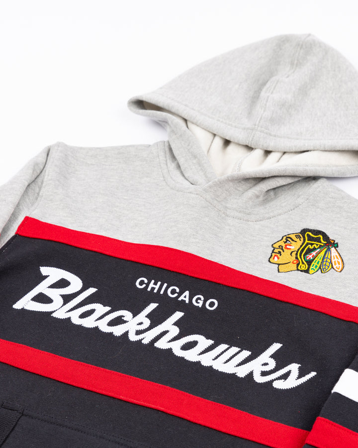 grey black and red youth Mitchell & Ness hoodie with Chicago Blackhawks wordmark logo and primary logo on front - detail lay flat