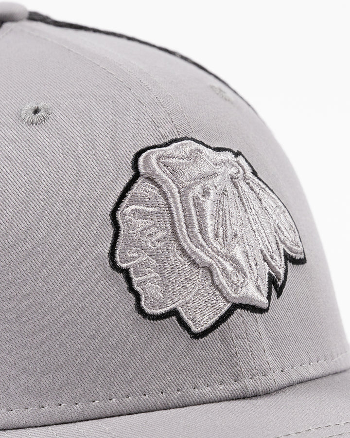 grey fitted New Era cap with tonal grey Chicago Blackhawks primary logo on front - detail lay flat