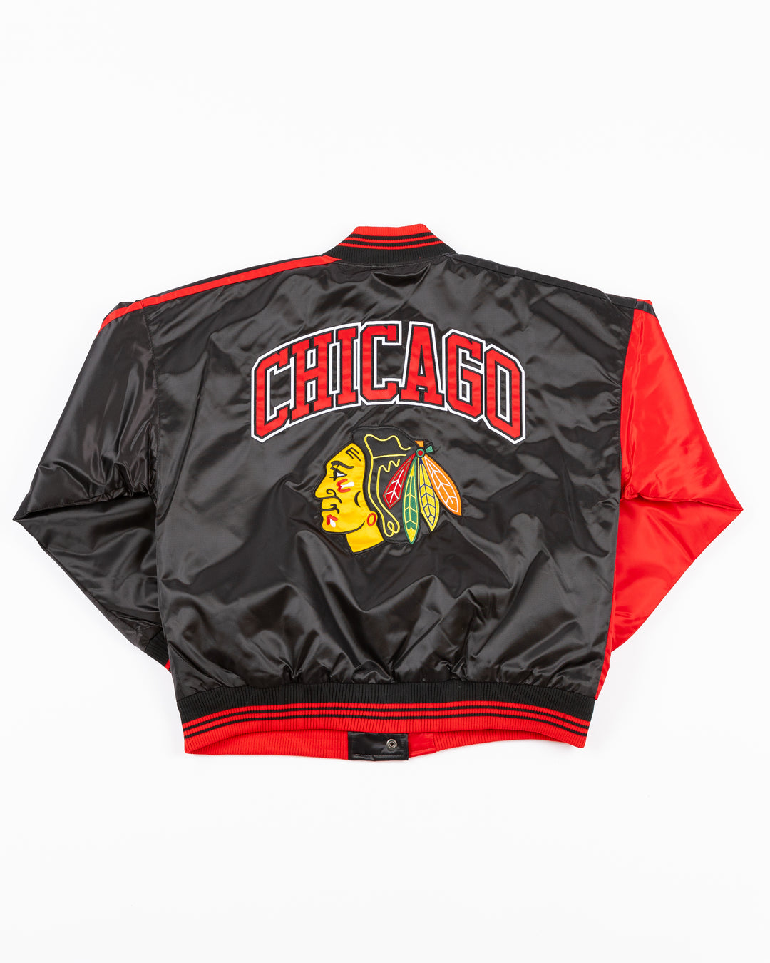 two tone red and black women's Starter jacket with Blackhawks wordmark on front and Chicago wordmark on back with Chicago Blackhawks primary logo - back lay flat