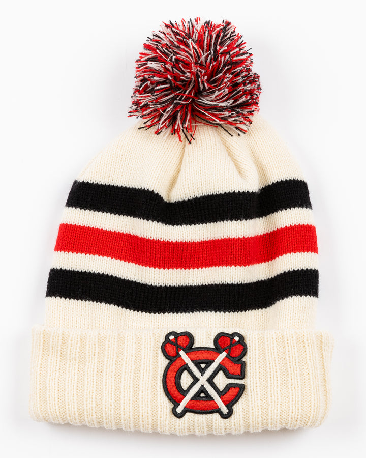 striped cream red and white American Needle knit pom hat with multicolor pom and Chicago Blackhawks secondary logo embroidered on front and NHL Winter Classic logo embroidered on back - front lay flat