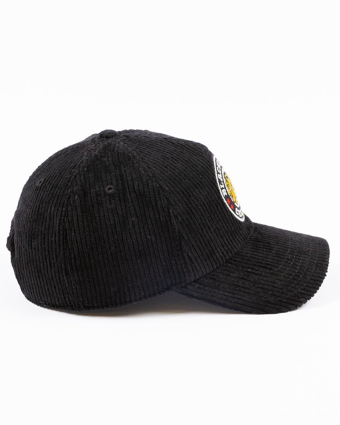 black corduroy American Needle snapback cap with Chicago Blackhawks Winter Classic logo on front and NHL Winter Classic logo on left side - right side lay flat