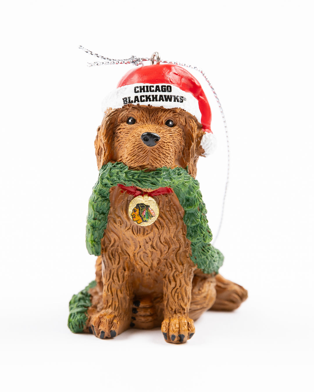 dog wearing Santa hat and holding garland with Chicago Blackhawks wordmark and primary logo ornament - front lay flat