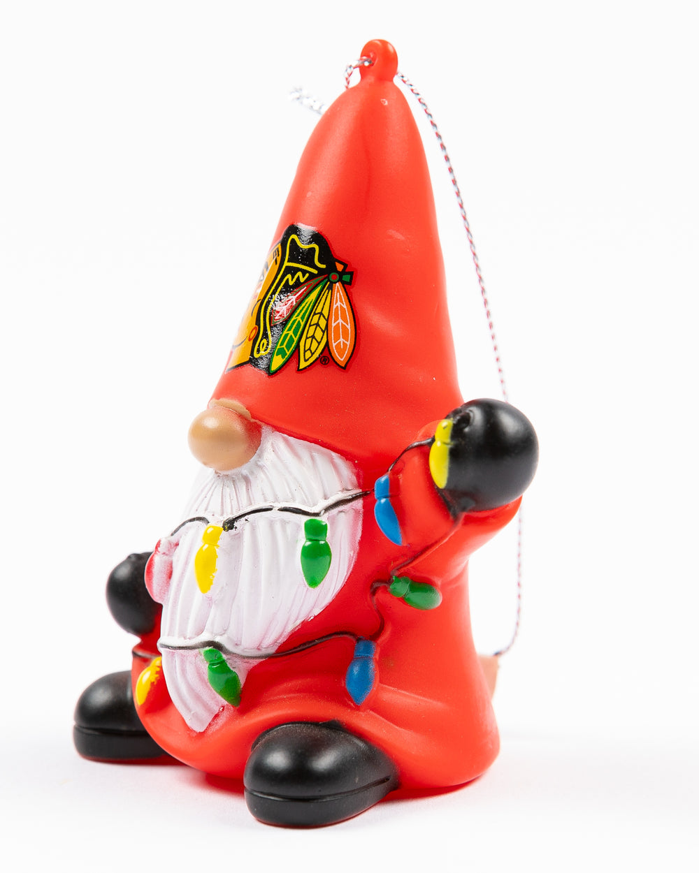 gnome with Chicago Blackhawks primary logo on hat holding holiday string lights ornament - left angle lay flat