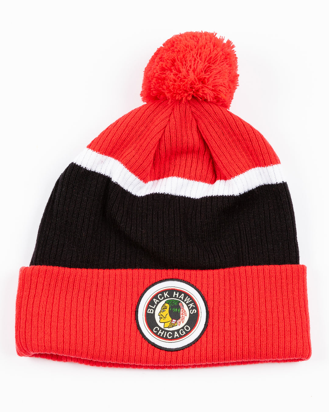 red, black and white CCM knit pom with red pom on top and vintage Chicago Blackhaks logo embroidered on front cuff - front lay flat