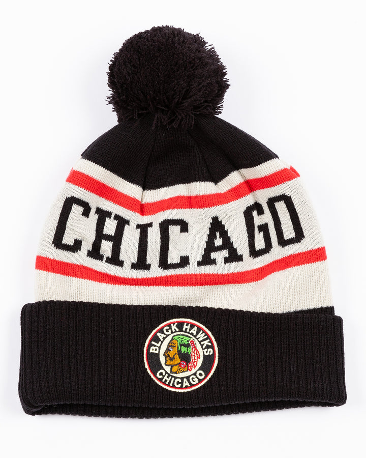 black, white and red CCM beanie with Chicago wordmark on front and vintage Chicago Blackhawks logo on front cuff and black pom on top - front lay flat