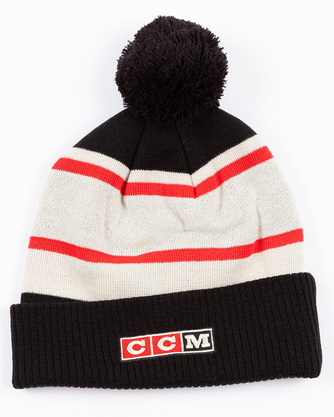 black, white and red CCM beanie with Chicago wordmark on front and vintage Chicago Blackhawks logo on front cuff and black pom on top - back lay flat