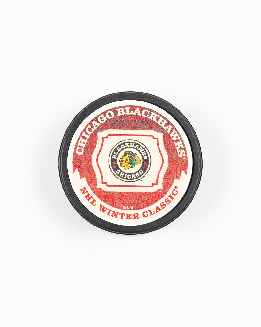 Mustang hockey puck with Chicago Blackhawks Winter Classic matchup against St. Louis design on front - front lay flat