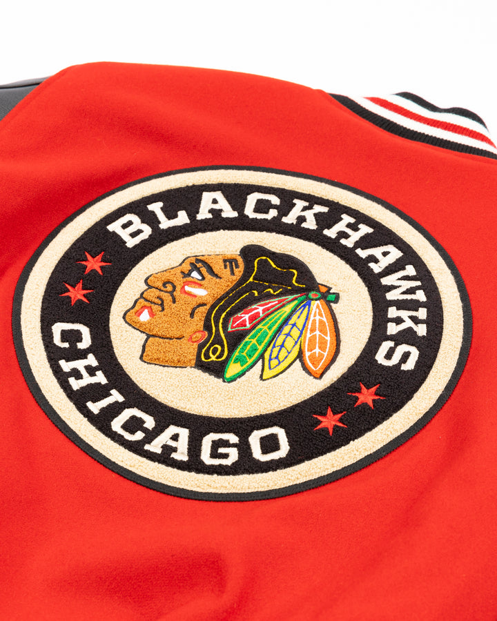 Golden Bear coaches jacket with leather sleeves and Chicago Blackhawks secondary logo on left chest, NHL Winter Classic logo on right sleeve and Chicago Blackhawks Winter Classic logo on back - back lay flat